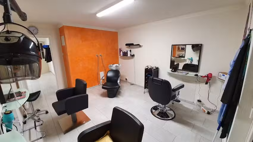 Style de coiffeur Unico